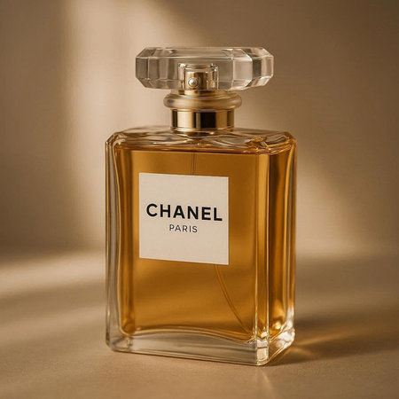 Chanel perfume bottle on brown background. Chanel is a French luxury perfume company, founded in...