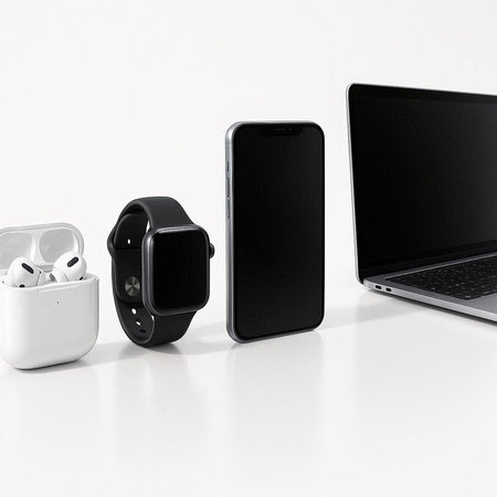 Smart watch, smart phone and earphones on a white background.