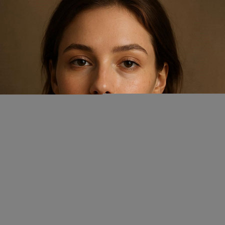Portrait of a beautiful young woman with natural make-up and brown hair