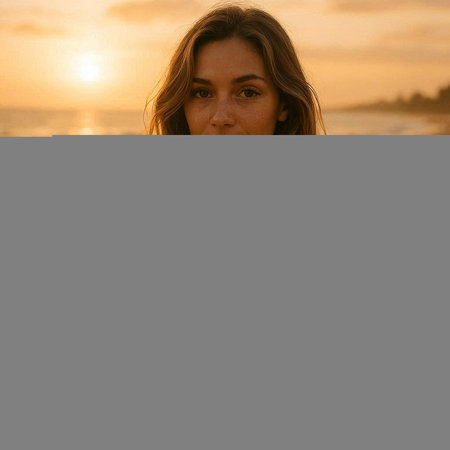 Beautiful young woman on the beach at sunset. Outdoor lifestyle portraitの写真素材