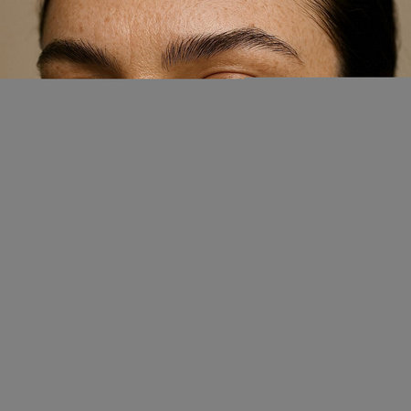 Portrait of a beautiful young woman with long eyelashes and eyebrows