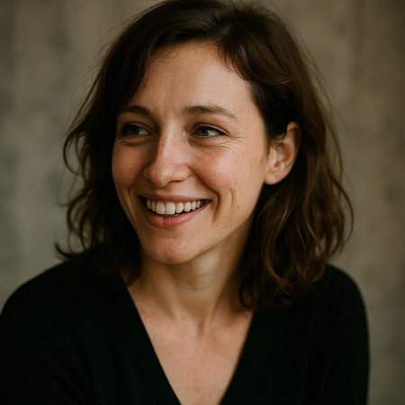 Portrait of a beautiful middle-aged woman smiling at the camera.