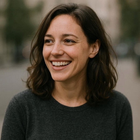 Portrait of a smiling middle-aged woman in the street.