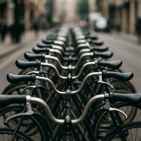 Bicycles parked in a row on the streets of Amsterdam.