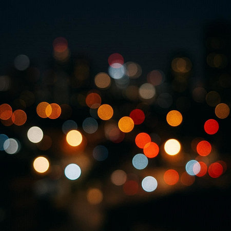 abstract background with bokeh defocused lights and cityscape