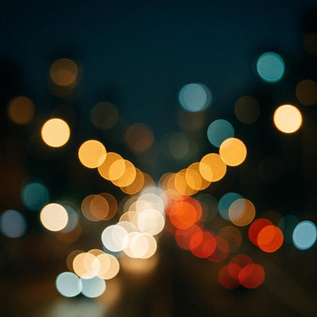 Abstract circular bokeh background of city at night, defocused lights.