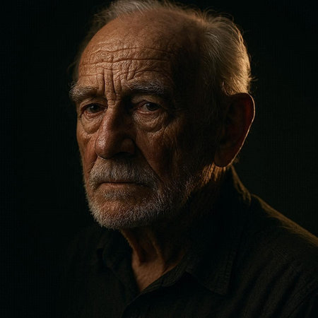 Portrait of an elderly man on a dark background. Toned.