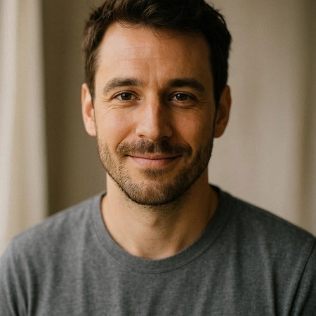 Portrait of a handsome man with a beard looking at the camera