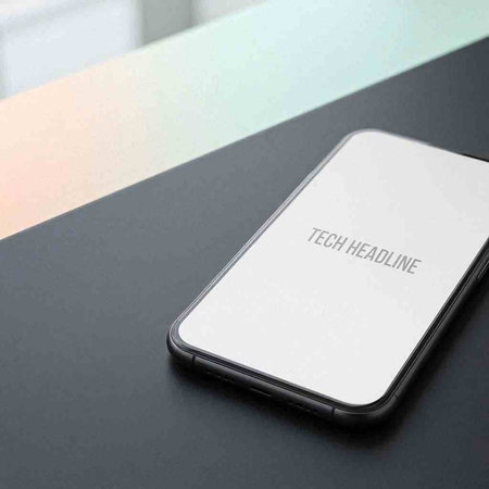 Smartphone with white screen on the table. 3d rendering.