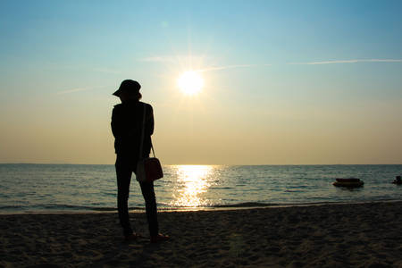 Shadow of woman on sea background on  the beach bangsaen Thailandの写真素材