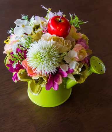 flower in watering  on tableの写真素材