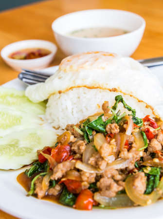 Thai food Stir fried pork with basil and egg の写真素材