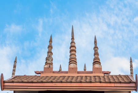 Carved wooden gables and sky background の写真素材