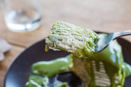 green tea Crepe Cake on forkの写真素材