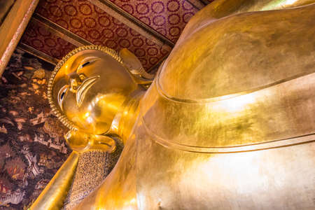 Seated Buddhas at the temple  Bangkok, Thailand.