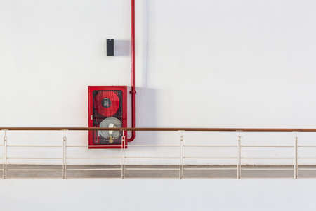 Fire extinguisher in the wall.