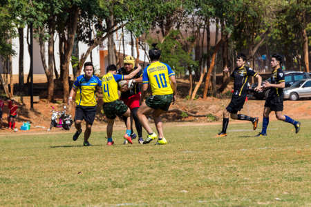 Khonkaen, Thailand-February 6:Unidentified rugby players in action during the khon kaen university game at khon kaen university Stadium on February 6, 2016, Thailandのeditorial素材