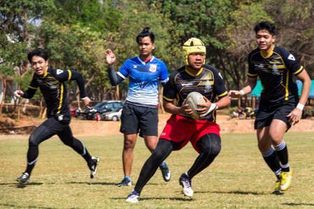 Khonkaen, Thailand-February 6:Unidentified rugby players in action during the khon kaen university game at khon kaen university Stadium on February 6, 2016, Thailandのeditorial素材