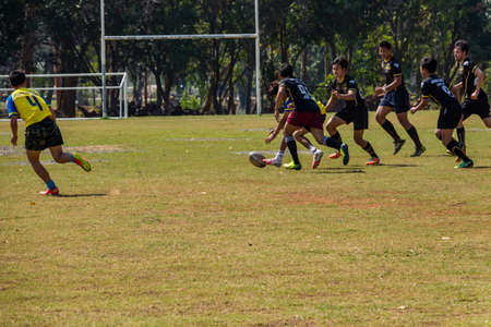 Khonkaen, Thailand-February 6:Unidentified rugby players in action during the khon kaen university game at khon kaen university Stadium on February 6, 2016, Thailandのeditorial素材
