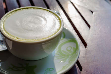 green tea latte on morning lightの写真素材