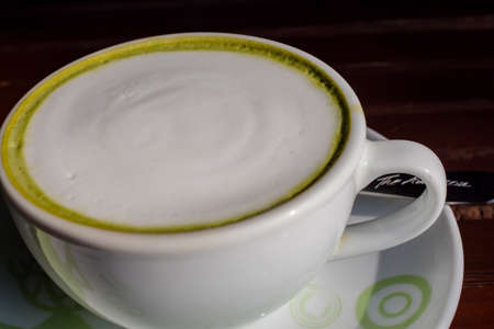 green tea latte on morning lightの写真素材