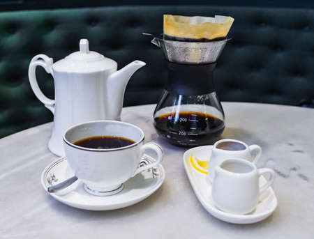 Drip brewing, filtered coffee, or pour-over is a method which involves pouring water over roasted, ground coffee beans contained in a filter.の写真素材