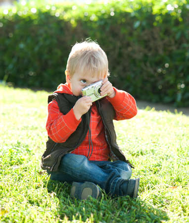 Portrait of a boy with Cameras