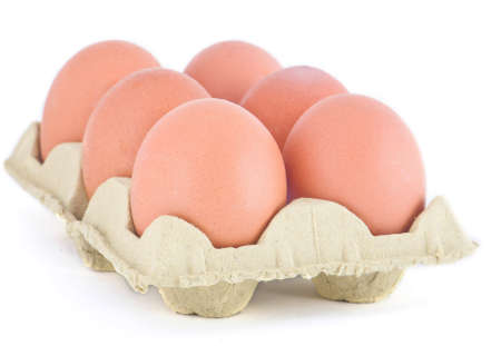 Eggs in a paper package on a white isolated background