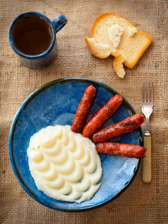 Mashed potatoes with fried sausage upper angleの写真素材