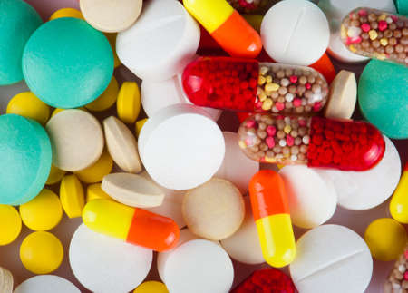 variety of colorful medicine close-up, capsules and tablets