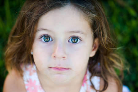 Little girl on the background of natureの写真素材