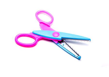 children, colorful scissors on a white backgroundの写真素材