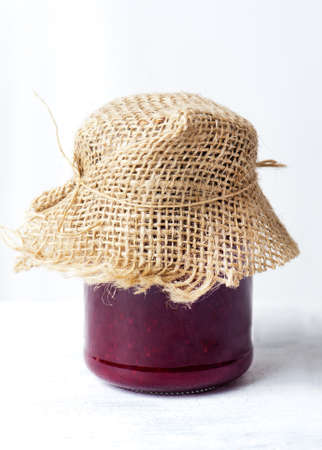 Raspberry jam on a white background isolatedの写真素材