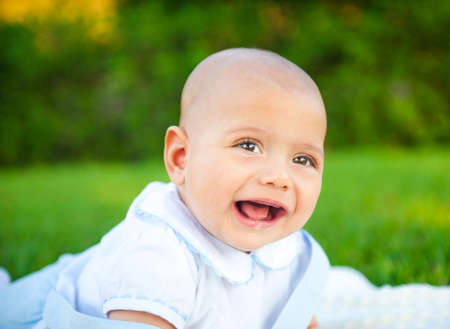 Cheerful cute kid on the natureの写真素材