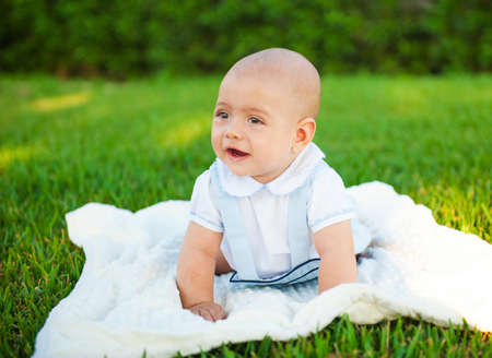 Cheerful cute kid on the natureの写真素材