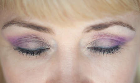 Photo of closed eyes, a beautiful professional make-up,の写真素材