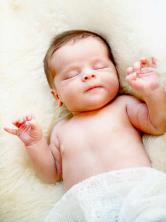 Little newborn baby boy 14 days, sleepsの写真素材