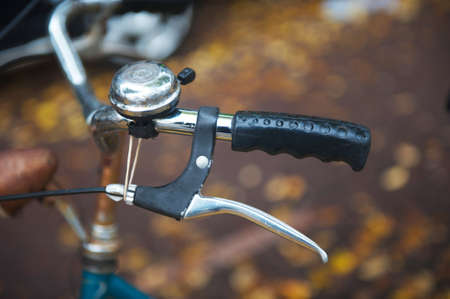handle bike with a bell with beautiful bokeh