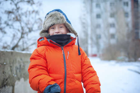 Portrait of a cute boy in winter