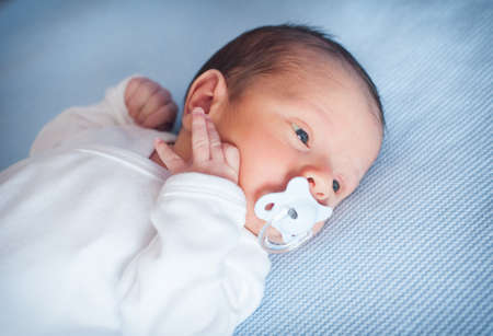 Little newborn baby boy 14 days, sleepsの写真素材