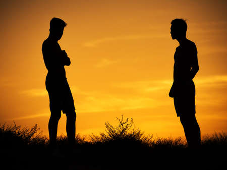 silhouettes of two young friends of the guys.