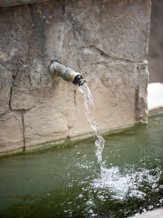 Mixer with falling water. Pure drinking water.の写真素材