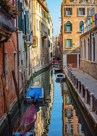Parked boats. Beautiful Canal in Venice Italyの写真素材
