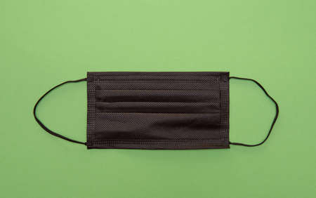black disposable medical face mask.