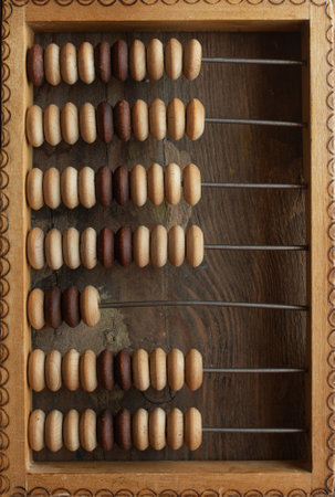 Old arithmetic abacus on the desk top view background with copy space.の写真素材