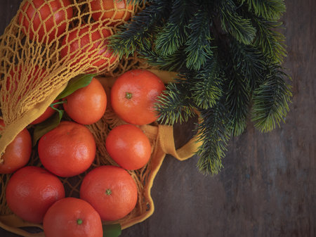 Tangerines in a grid at the Christmas tree.の写真素材