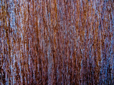 Close-up to old aged worn wood with browns and greysの写真素材