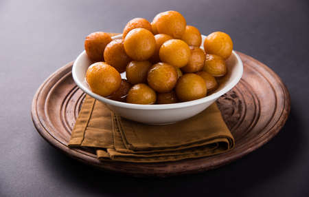 Gulab jamun, or gulaab jamun, is a milk-solids-based sweet mithaiの写真素材