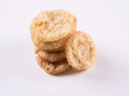 Big illuminated diwali diya or clay lamp placed over satin cloth creating rays effect in cloth, moody lighting, selective focusの写真素材