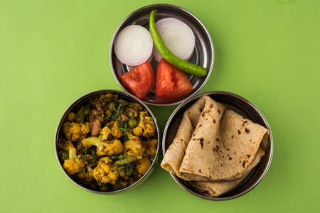 Fresh Green Chickpeas or Chick peas also known as harbara or harbhara in hindi and Cicer is...